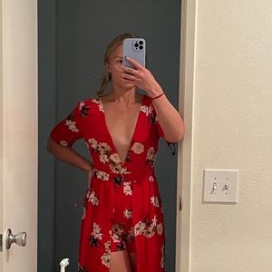 Red flower jumpsuit dress. Size Small / EU 34. New with tags, never been worn.
